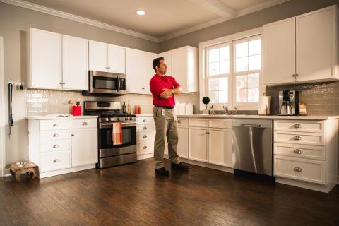 Man in kitchen